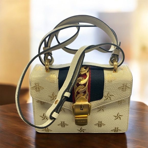 Gucci Handbags - Rare Gucci Gold Embossed Sylvie 2 Way Crossbody Bee & Star Purse